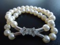 BRACELETE PEROLAS COM PEDRAS USADO